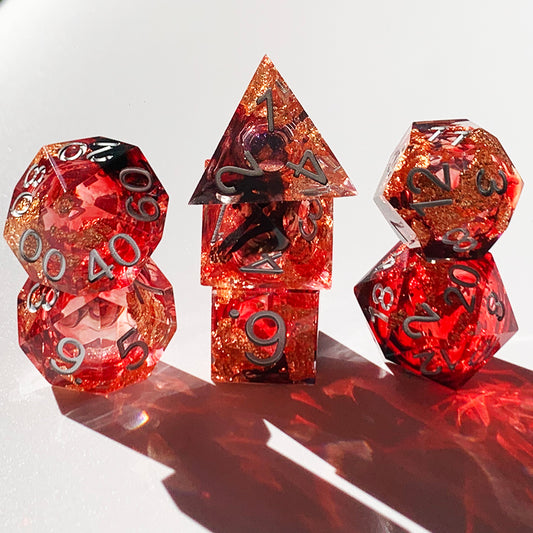 7pcs Handcrafted Sharp Edged Black Smoky Red Liquid Core Resin Dice Set