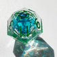 Blue liquid core dnd resin dice with green font for games