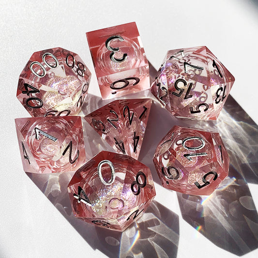 Pink romantic resin liquid core dnd dice set.