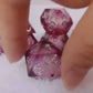 Glittering liquid core dice set for role playing games , pink red liquid core dice set