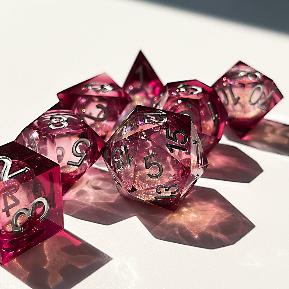 Glittering liquid core dice set for role playing games , pink red liquid core dice set